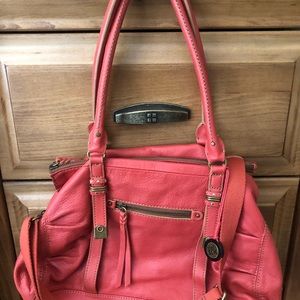 The Sak dark salmon satchel bag.